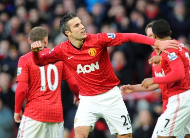 Robin van persie doing his Usain Bolt impression.
