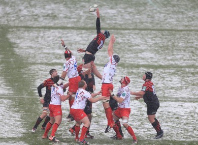 Saracens compete against Edinburgh at a snowy Vicarage Road on Sunday.