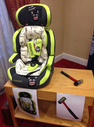 This child's car seat was in the Volkswagen Passat stolen before Adrian Donohoe was killed; the hammer to the right was found at the scene.