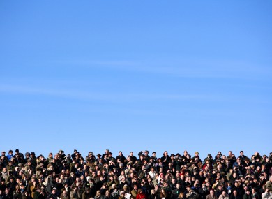 Race fans watch from the stands last year.