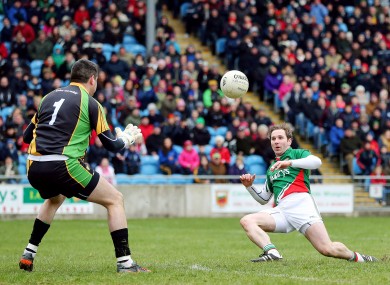 Mayo's Michael Conroy scores a goal past Donegal goalkeeper Paul Durcan.