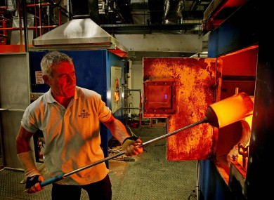 Glass blowers try to keep the furnace at the Waterford Crystal plant active while they continue a sit-in in 2010, hoping to safe the factory.