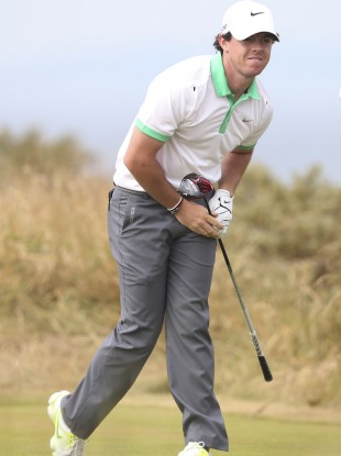 Rory McIlroy reacts to a wayward drive.