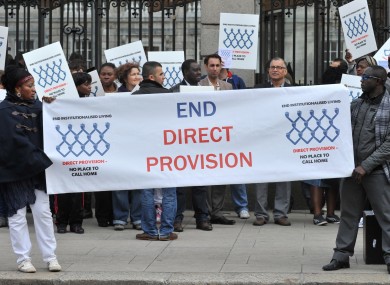 Asylum seekers, refugees, human rights supporters and members of the public protest outside Leinster House