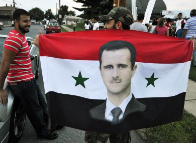 Members of the local Syrian community rally against the United States' involvement in Syria, yesterday in Allentown, Philadelphia.