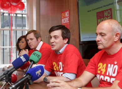 IMO representatives, including Industrial Relations Assistant Director Eric Young (right)