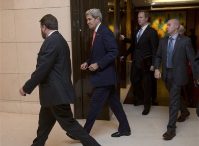 U.S. Secretary of State John Kerry, second left, arrives for a meeting with European Union's top diplomat Catherine Ashton.