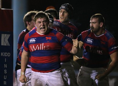 Tadhg Furlong celebrates after Clontarf are awarded a penalty try against UCD.