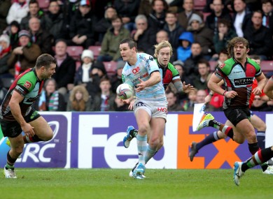 Jonny Sexton gets a pass away under the watchful eye of Nick Easter.