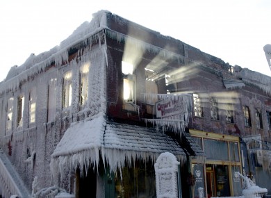 Sunlight streams through the windows of a building which caught on fire in Plattsmouth, Nebraska.