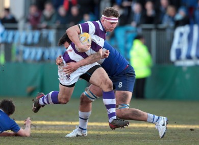 St Andrew's Greg Jones with Conor Gleeson of Clongowes.