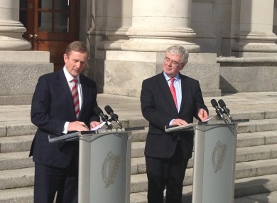 Enda Kenny and Eamon Gilmore outside Government Buildings today