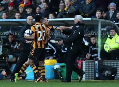 Newcastle United's manager Alan Pardew confronts Hull City's David Meyler.