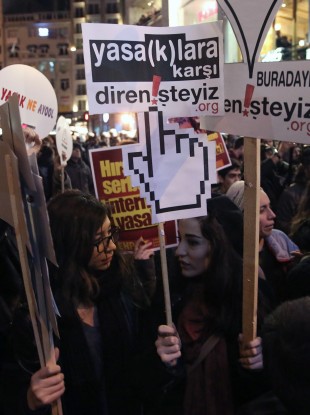 Protesters holding a sign saying 'we resist bans' at a protest against internet restrictions in Istanbul last month.