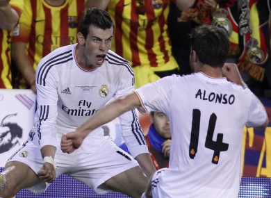 Gareth Bale, left, celebrates with Xabi Alonso after scoring his team's second goal during the final of the Copa del Rey.
