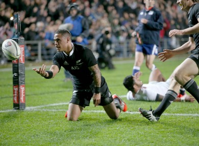 Smith celebrates his first try against England.