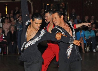 Sergio Brilhante, left, and Jonathan Morrison take part in a ballroom dancing competition