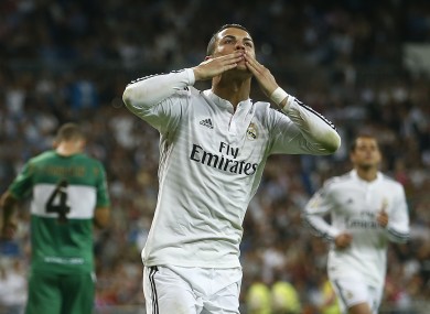 Cristiano Ronaldo celebrates scoring his third goal against Elche earlier tonight. He's now scored seven times in the past four days.