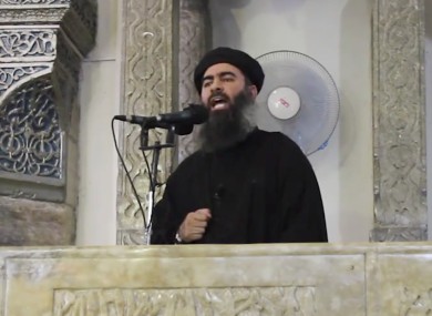 Abu Bakr al-Baghdadi, delivering a sermon at a mosque in Iraq.