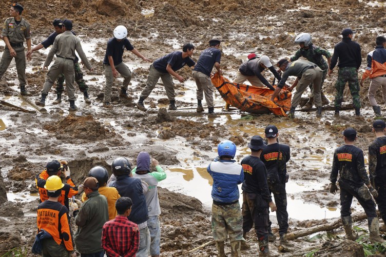 Rescuers Dig Through Mud After Indonesian Landslide Kills 8 People