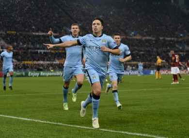 Manchester City's Samir Nasri celebrates scoring his side's first goal of the game against Roma.