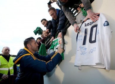 Kean signing jerseys after yesterday's training session.