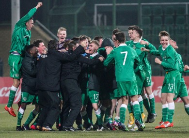 The Ireland players celebrate at the final whistle in Grodzisk Wielkopolski.