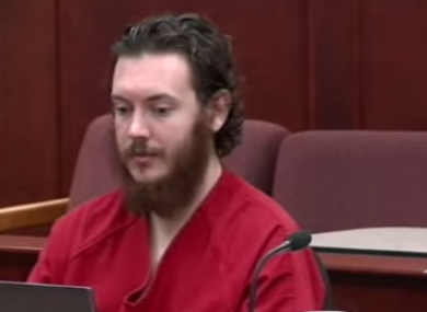 James Holmes sits at an earlier pre-trial hearing.