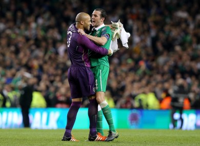 Ireland goalkeeper Darren Rabdolph and John O’Shea celebrate after the game.