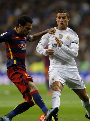 Alves and Barcelona ran out 4-0 winners in the first Clasico of the season.