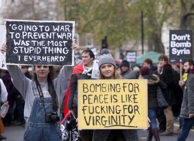 Anti-war activists protest outside Downing Street ahead of today's Commons vote on military intervention in Syria.