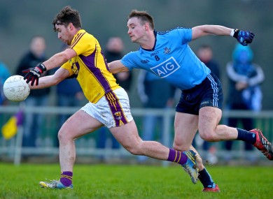 Ben Brosnan of Wexford and Dublin's Eoin Culligan in action in Enniscorthy.