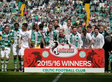 The Celtic players are crowned champions.