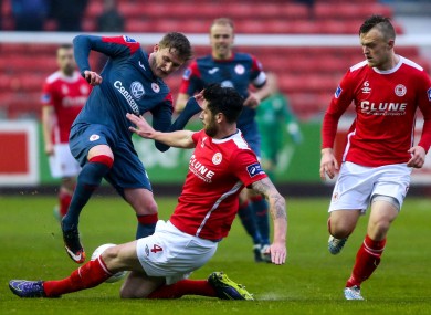 Goalscorer Sadlier, pictured her being tackled by Darren Dennehy of St Patrick's Athletic (file photo).