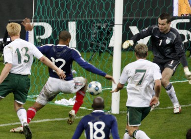 France's Thierry Henry, left, passes the ball as Ireland's goalkeeper Shay Given, right, tries to stop it, just before William Gallas (unseen) scored the goal for France during their World Cup qualifying playoff second legmatch at the Stade de France stadium in Saint Denis outside Paris in November 2009.