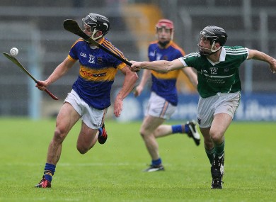 Tipperary's Conor Hammersley and Limerick's Richie English.