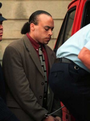 Mark Nash being led into a prison van after leaving the Circuit Criminal Court in Dublin in 1998.