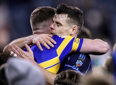 Dublin team-mates Ciaran Kilkenny and Kevin MacManamon hug after the final whistle.