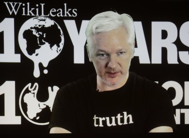 WikiLeaks founder Julian Assange participates in the conference via video link.
