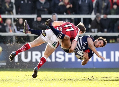 Ulster's Andrew Trimble with Nans Ducuing of Bordeaux-Begles.