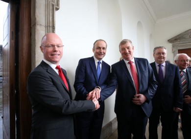 Stephen Donnelly (left) with Fianna Fáil party leader Micheál Martin and Pat Casey at Leinster House yesterday.