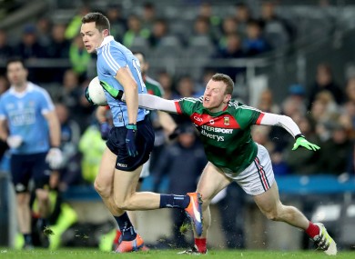 Dublin's Dean Rock escapes from Mayo's Colm Boyle.