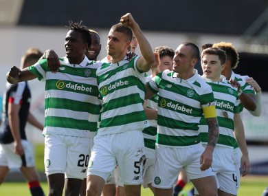 The Celtic players celebrate Jozo Simunovic's opener.