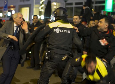 Demonstrators battle with Dutch riot police after riots broke out near the Turkish consulate in Rotterdam, Netherlands.