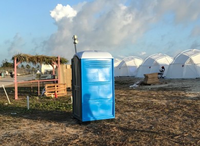 Tents and a portable toilet set up for attendees for the cancelled Fyre Festival.