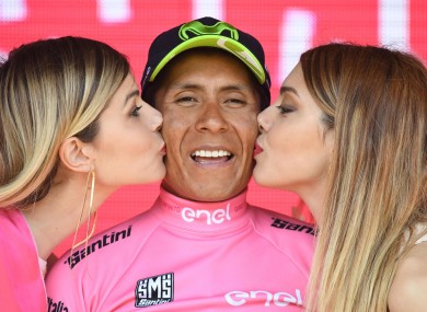 Colombian rider Nairo Quintana wears the pink jersey of the overall leader.