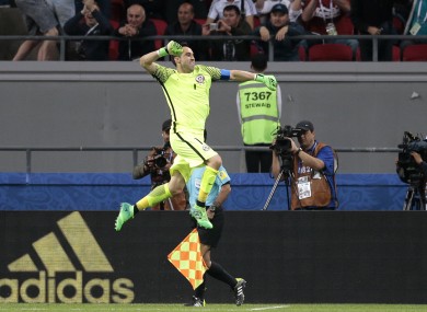 Claudio Bravo celebrates winning the Confederations Cup semi-final.