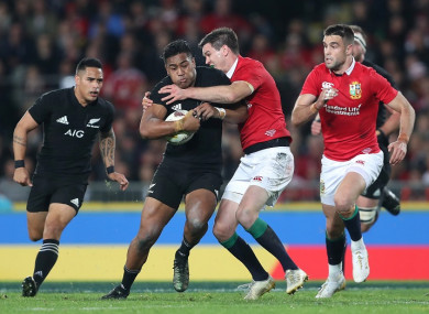 Julian Savea is tackled by Johnny Sexton during the third test between New Zealand and the British & Irish Lions.