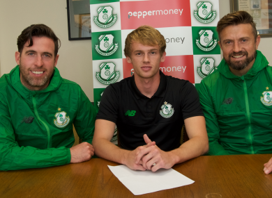 King with manager Stephen Bradley and director of football Stephen McPhail.