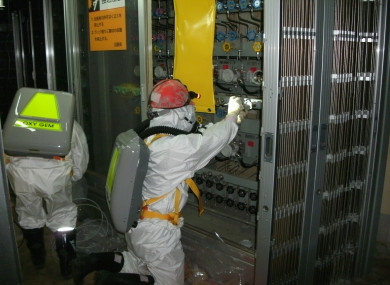 Workers inside the crippled nuclear plant